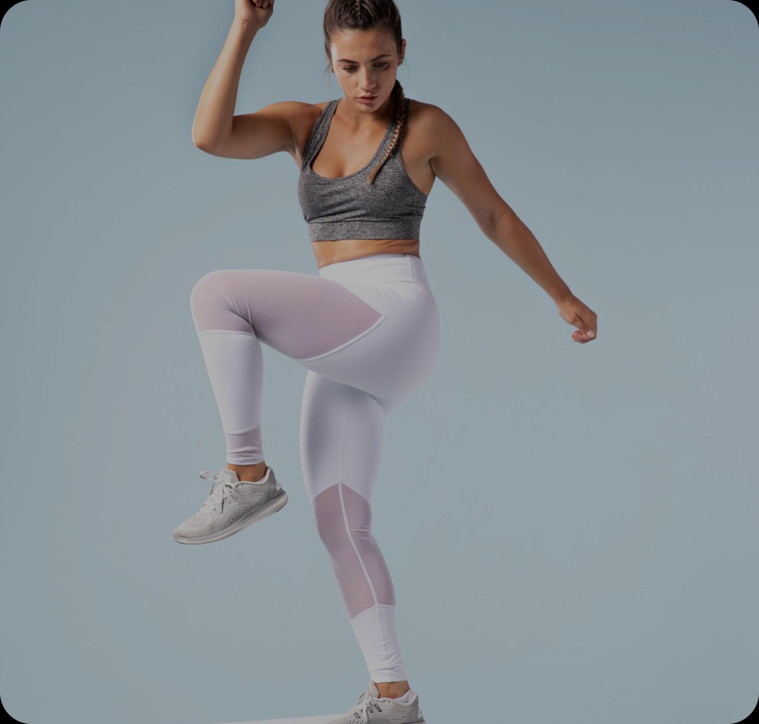 Athlete performing barbell squat for velocity-based training